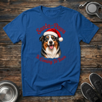 Santa Paws is Coming to Town royal blue t-shirt with stunning
realistic Australian Shepherd wearing Santa hat and bold red
festive script, funny Christmas dog lover tee and Aussie gift