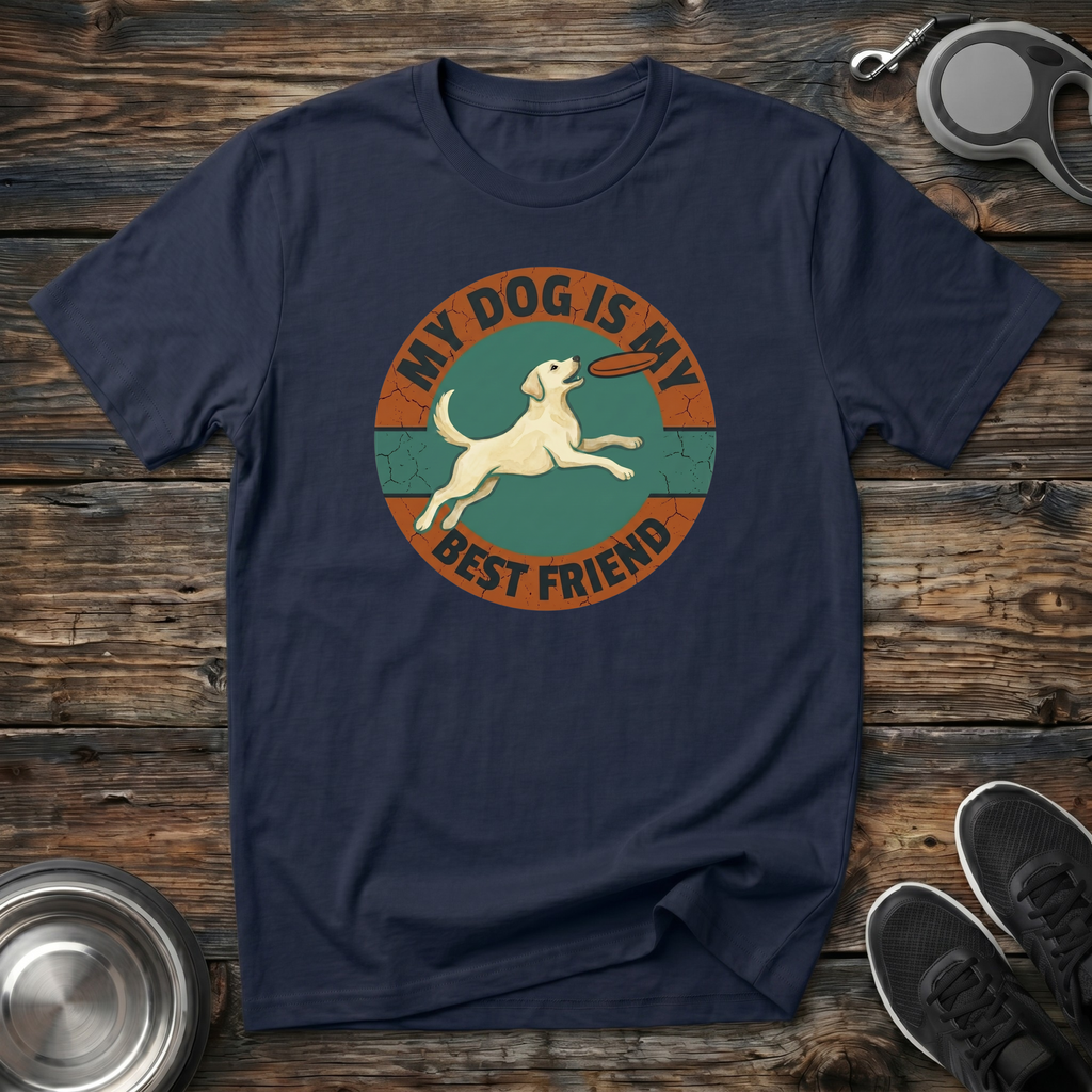 Navy blue unisex t-shirt with retro vintage circular badge graphic featuring a leaping Labrador and "My Dog Is My Best Friend" lettering in teal and burnt orange — heartfelt dog lover gift tee