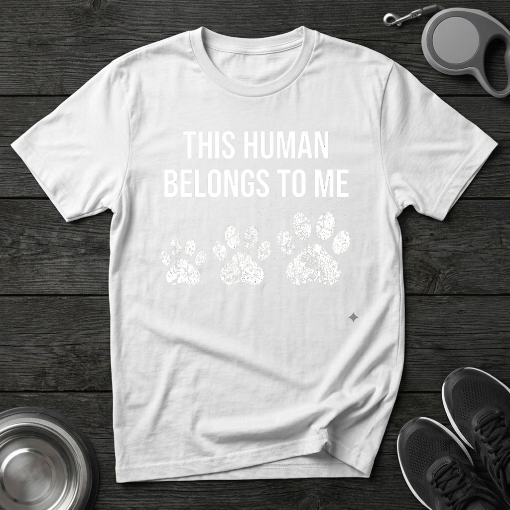 This Human Belongs To Me Funny Dog Owner T-Shirt – Bold Paw Print Graphic Tee Told From the Dog's Perspective