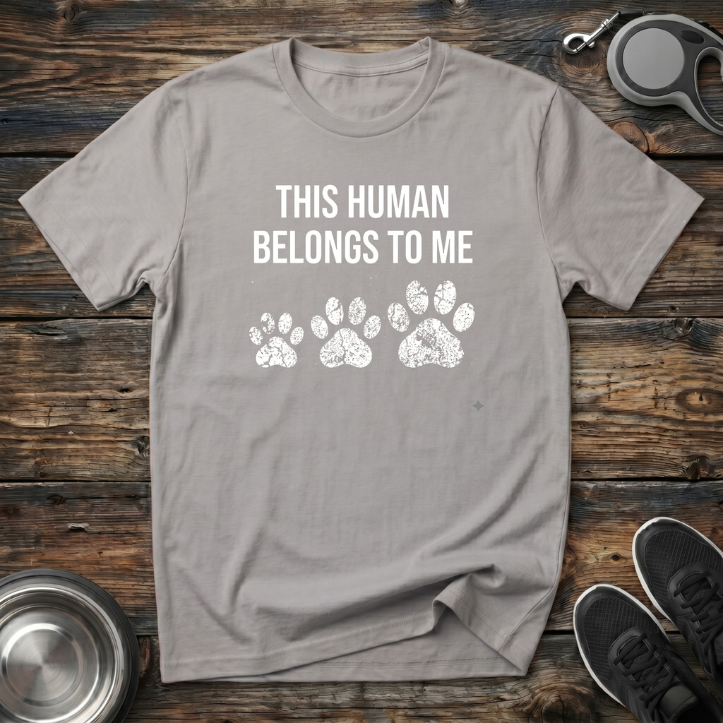 This Human Belongs To Me Funny Dog Owner T-Shirt – Bold Paw Print Graphic Tee Told From the Dog's Perspective