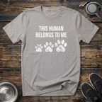 This Human Belongs To Me Funny Dog Owner T-Shirt – Bold Paw Print Graphic Tee Told From the Dog's Perspective