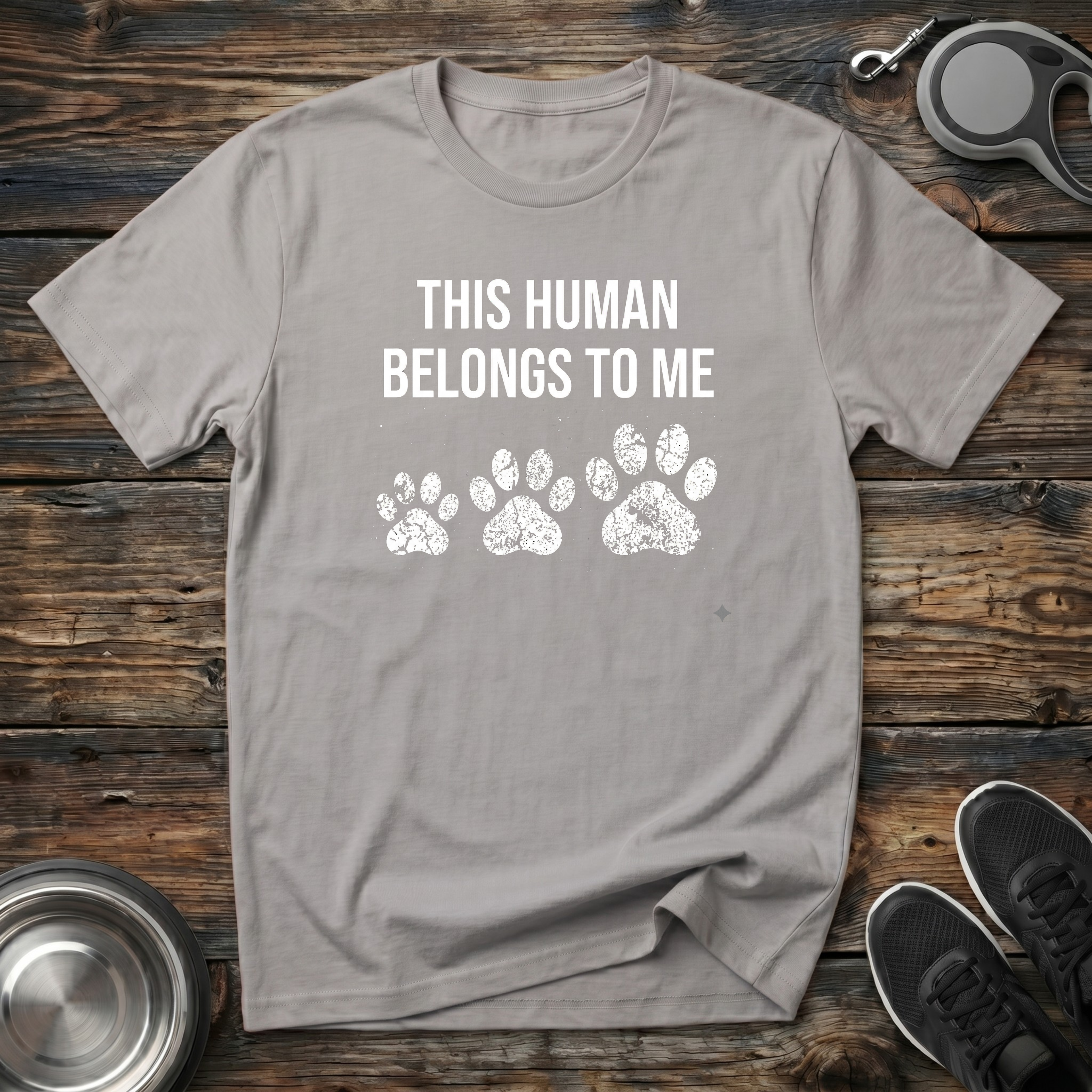 This Human Belongs To Me Funny Dog Owner T-Shirt – Bold Paw Print Graphic Tee Told From the Dog's Perspective