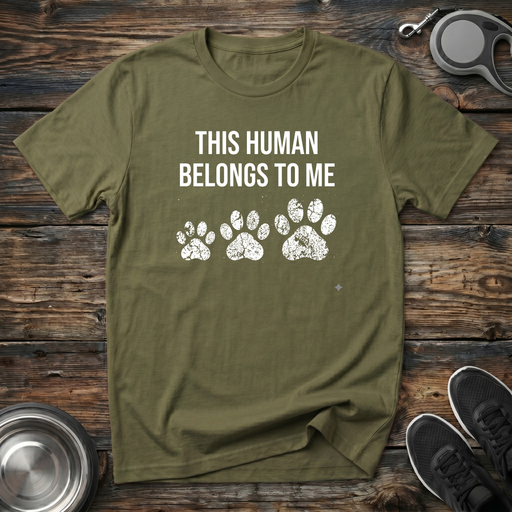 This Human Belongs To Me Funny Dog Owner T-Shirt – Bold Paw Print Graphic Tee Told From the Dog's Perspective