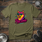 Military green unisex t-shirt with bold colorful retro dog wearing sunglasses graphic in hot pink, yellow and purple with neon "Paw-some" brush script — vibrant 80s style dog lover gift tee