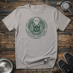 The Loyal Companion natural stone t-shirt with stunning dark
forest green botanical French Bulldog portrait in intricate
fern and floral wreath circle, elegant Frenchie lover tee