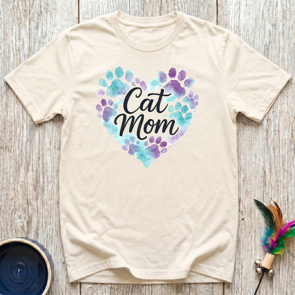 Cat Mom natural cream t-shirt with stunning watercolor heart
of teal purple and lavender paw prints with elegant script,
beautiful cat mom tee and mother's day cat lover gift