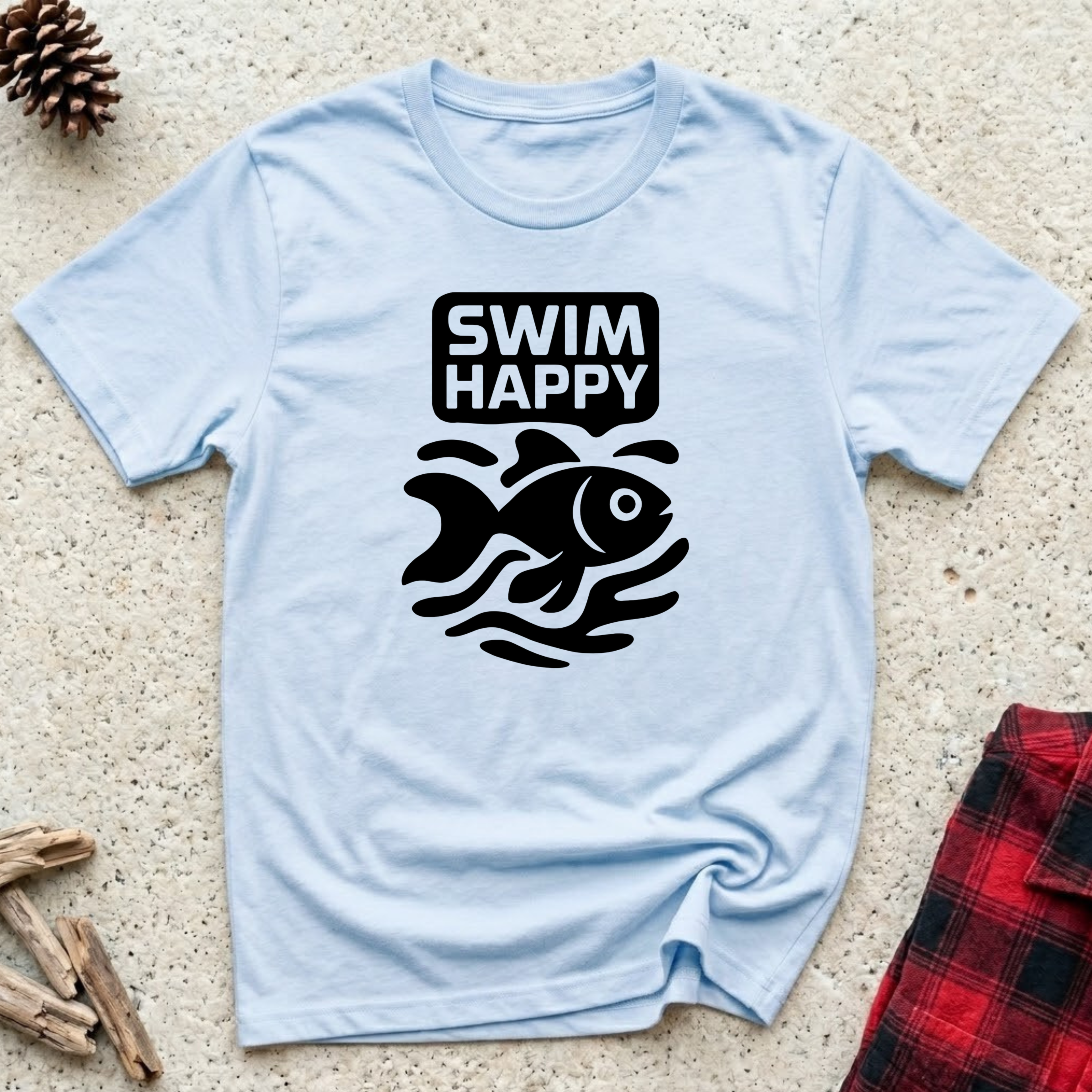 Swim Happy powder blue t-shirt with bold black graphic fish
swimming through stylized waves with strong block typography,
fresh fish lover tee and aquarium ocean swimmer gift