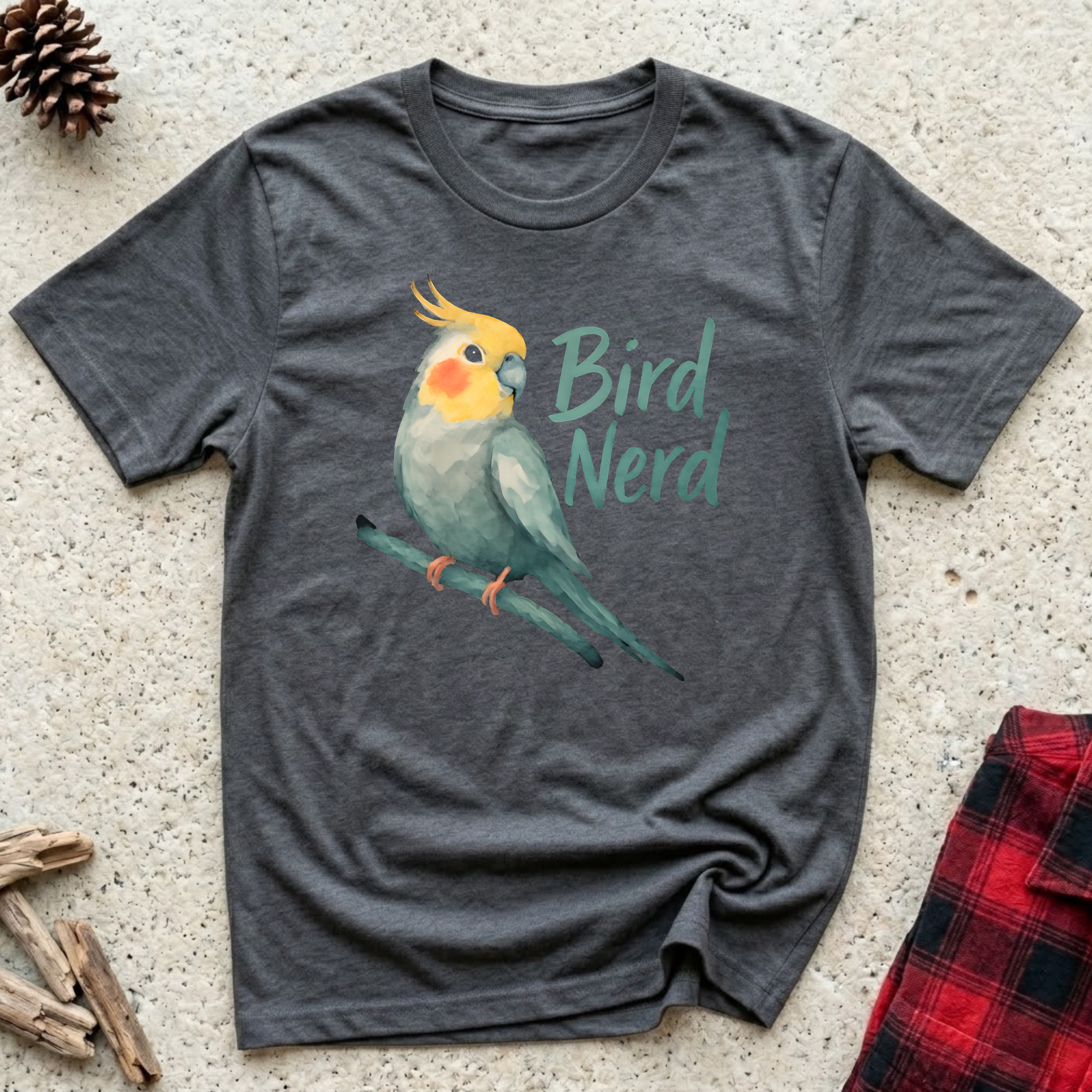 Bird Nerd charcoal t-shirt with stunning watercolor cockatiel
in sage green yellow and orange with teal script,
beautiful bird lover tee and cockatiel mom dad gift