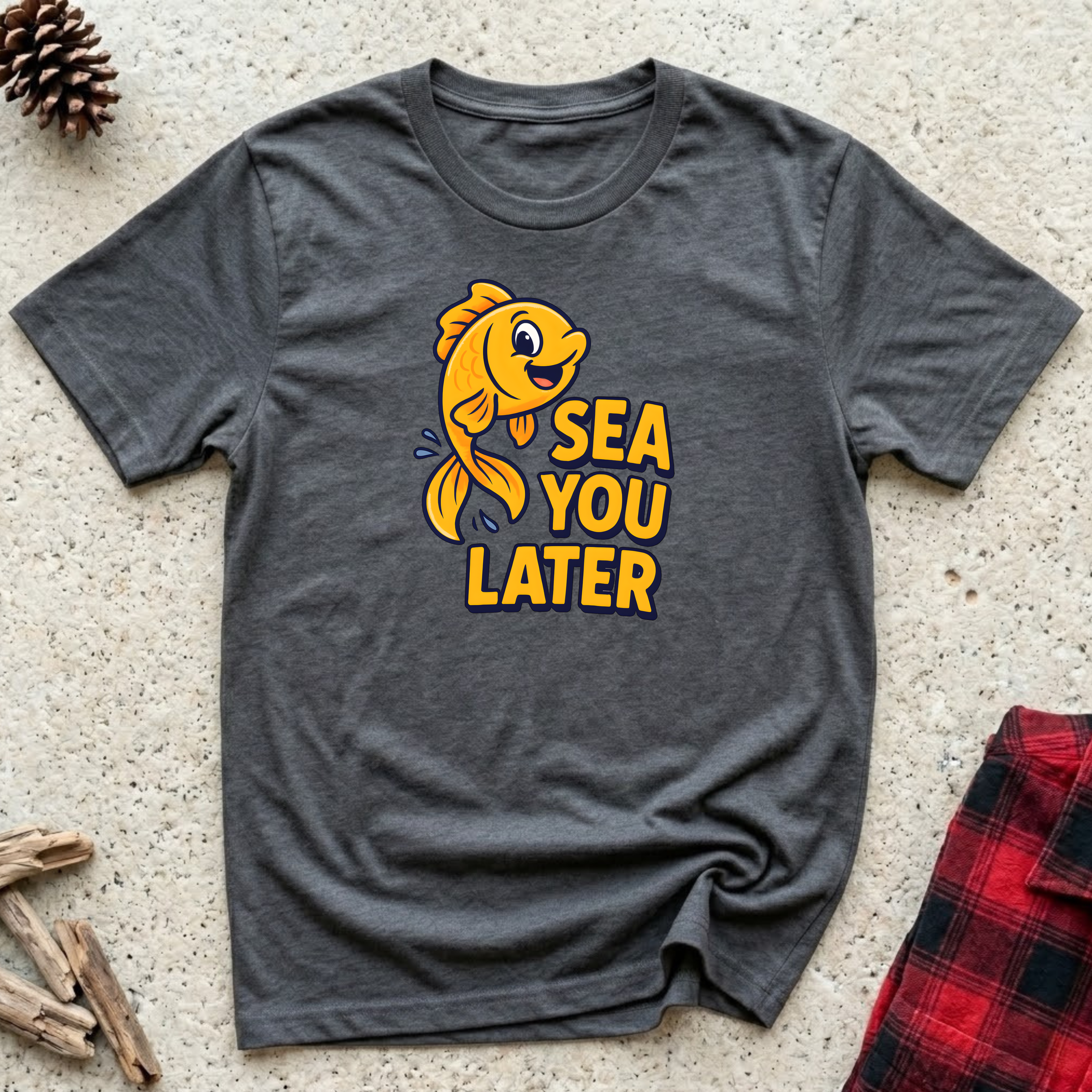 Sea You Later charcoal t-shirt with bold cheerful golden fish
waving in sunshine yellow and blue, funny fish lover pun tee
and aquarium owner ocean gift