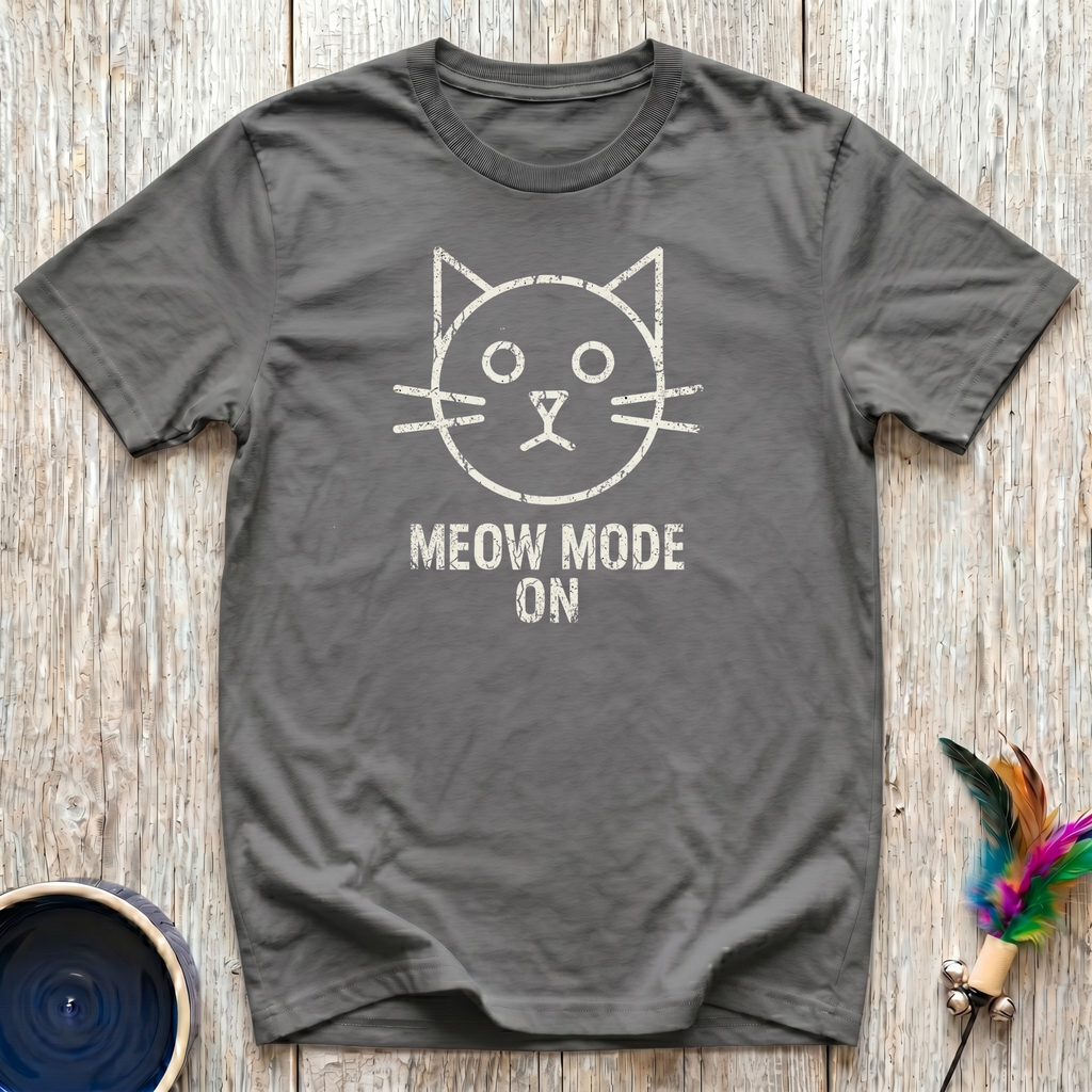 Meow Mode On military olive t-shirt with simple distressed
chalk-style cat face and bold text in weathered white,
funny minimalist cat lover tee and cat mom dad gift