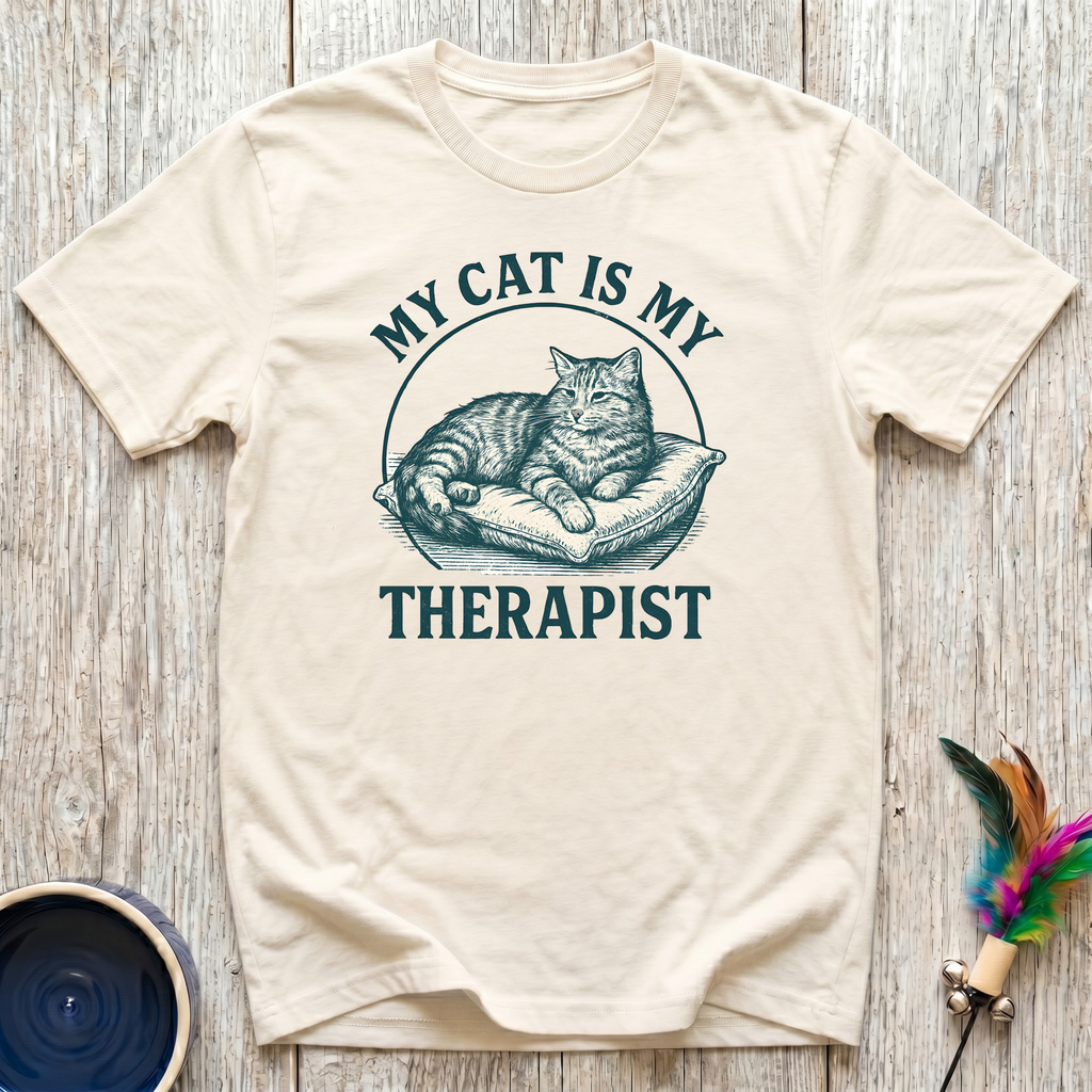 My Cat is My Therapist cream t-shirt with stunning vintage
engraving style tabby cat on cushion in rich teal lettering,
funny emotional cat lover tee and cat mom mental health gift