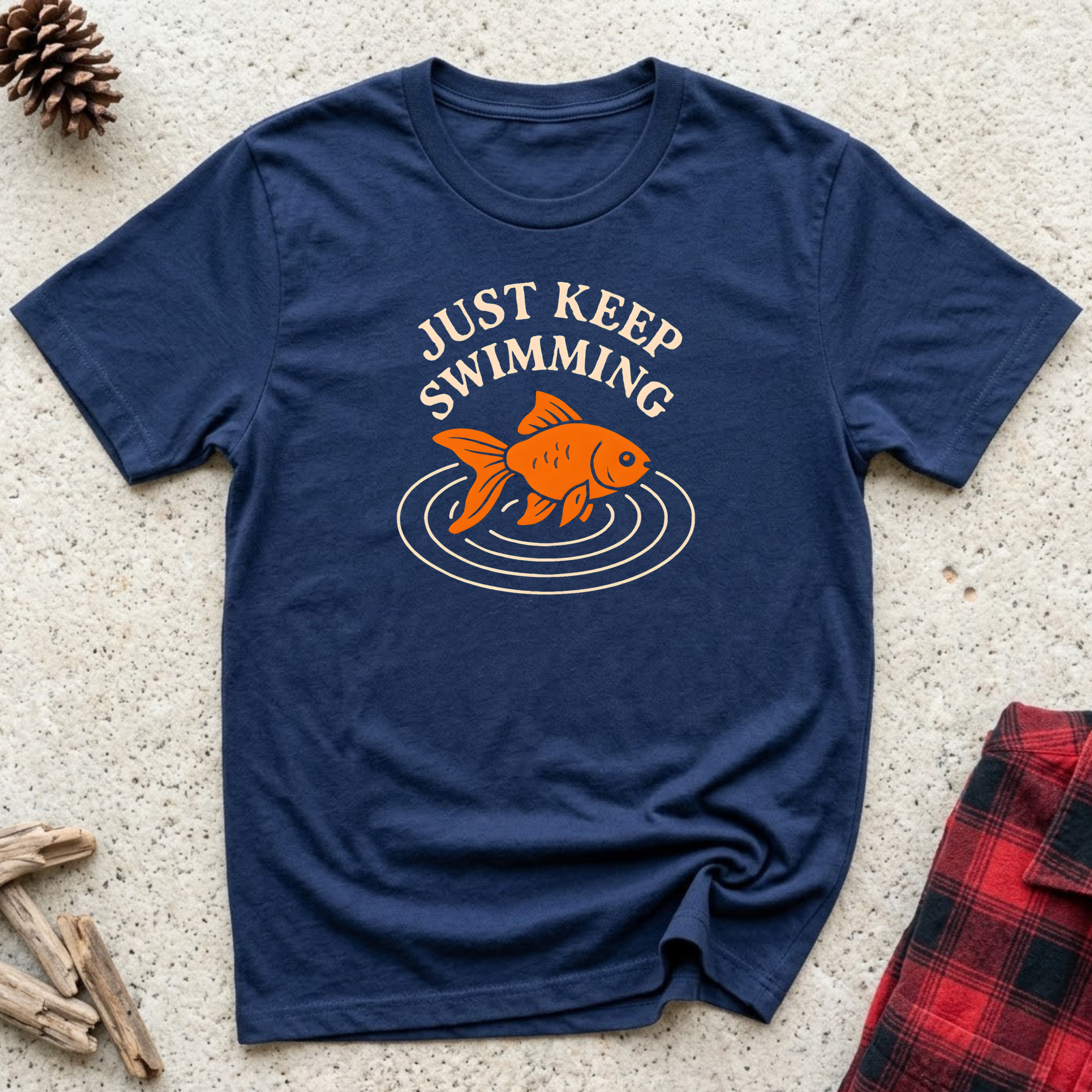 Just Keep Swimming navy t-shirt with vintage retro bold orange
goldfish and water ripple badge design in orange and cream,
classic fish lover tee and aquarium owner gift