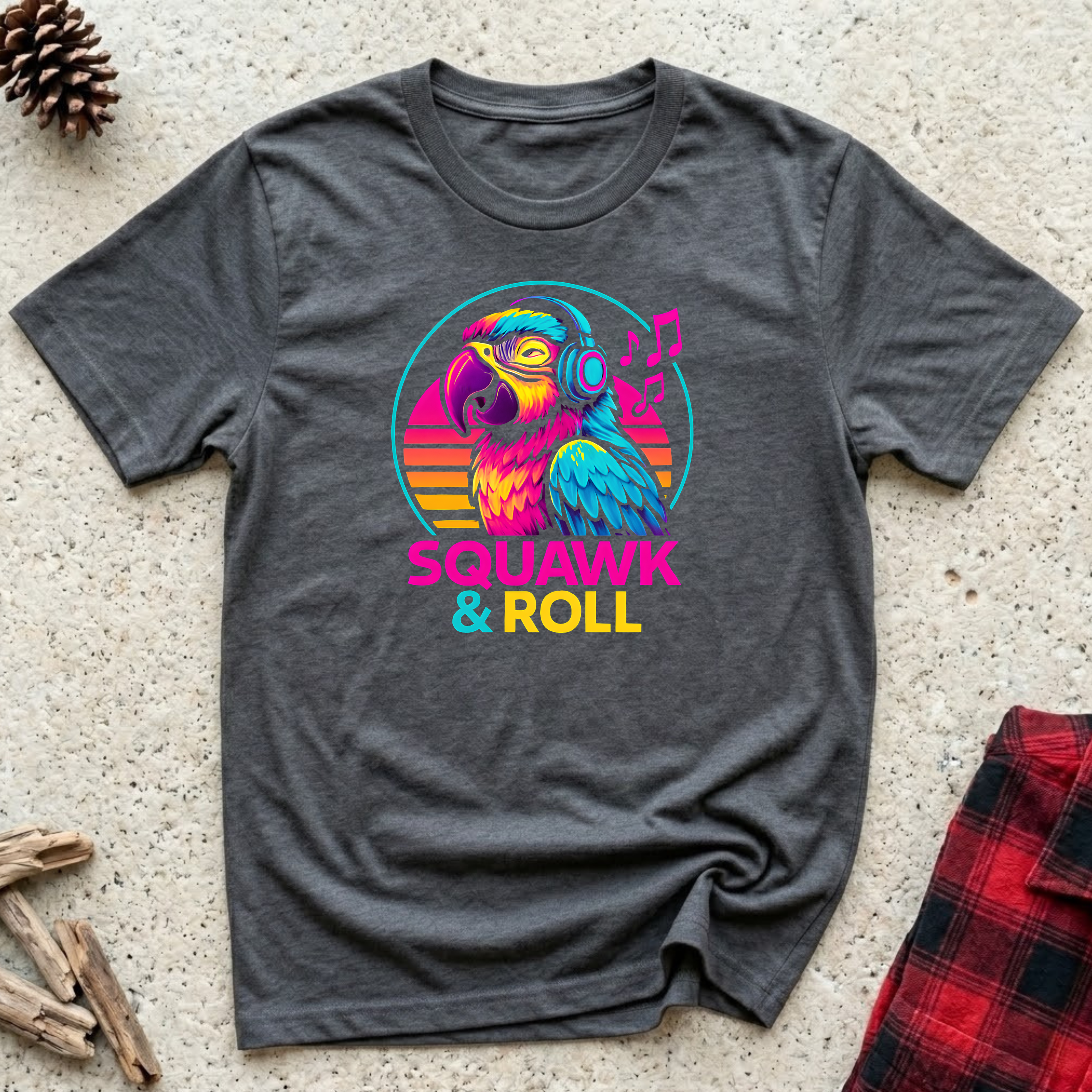 Squawk and Roll charcoal t-shirt with parrot wearing headphones
in vibrant retro sunset circle, funny bird lover music tee and parrot owner gift