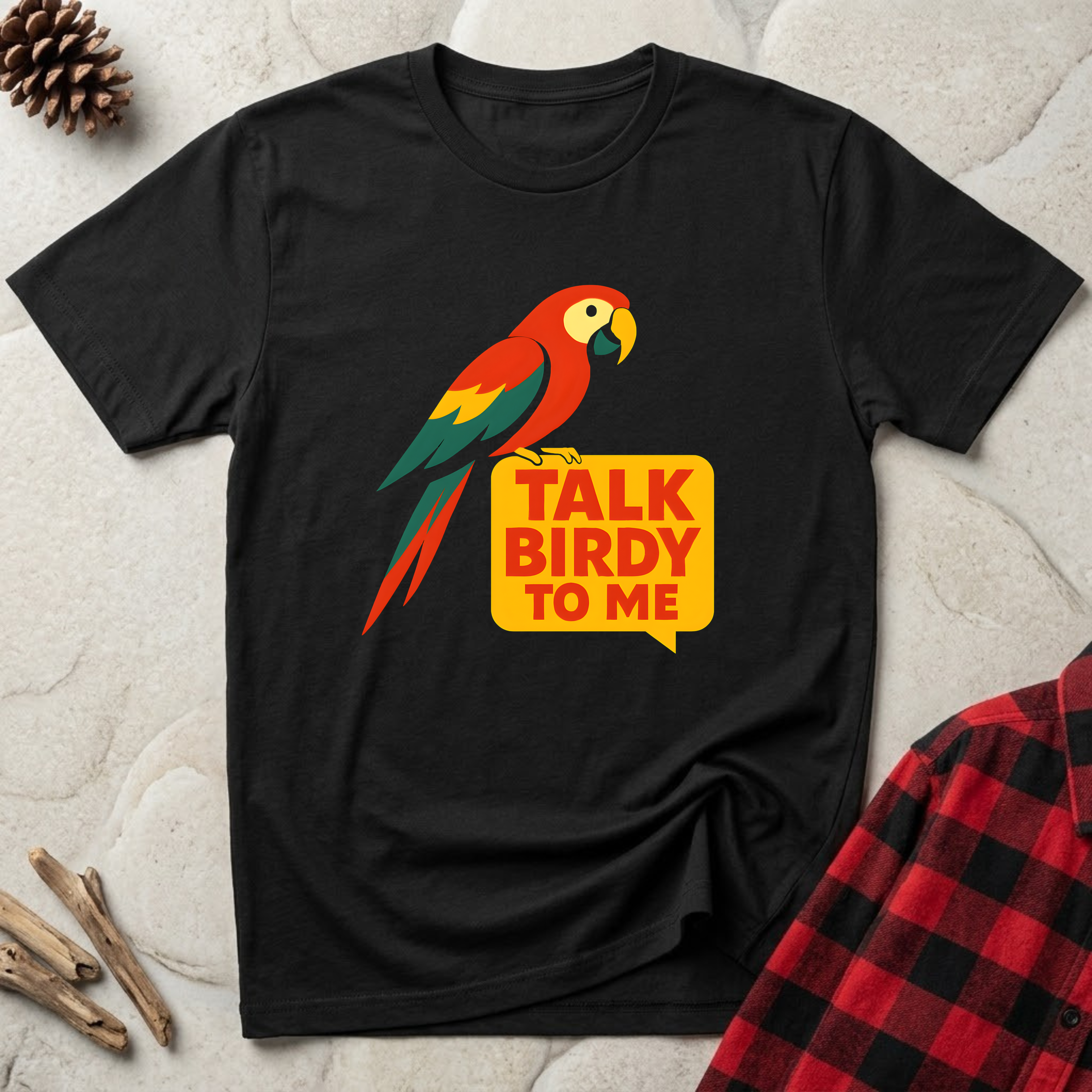 Talk Birdy to Me black t-shirt with scarlet macaw illustration
and bold yellow speech bubble, funny parrot lover tee and macaw owner gift mom gift dad gift